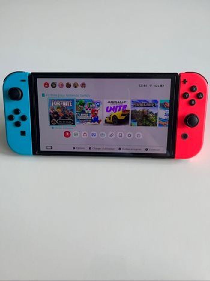 🎮Nintendo Switch Oled - État impeccable + boîte  complète + facture - photo numéro 2