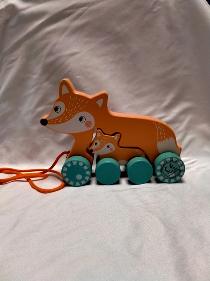 Renard et son petit à tirer