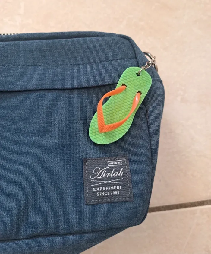 Trousse de toilette à fermeture éclair bleu/orange Airlab en TBE - photo numéro 3