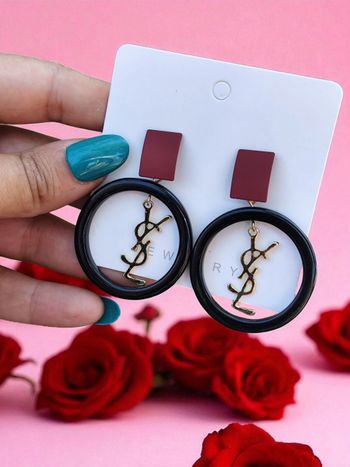 Boucle d'oreille Yves Saint Laurent  ✅