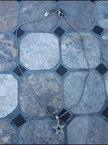Collier argenté avec pendentif étoile
