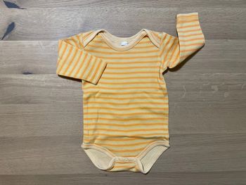 Bodie manches longues orange à rayures 6 mois