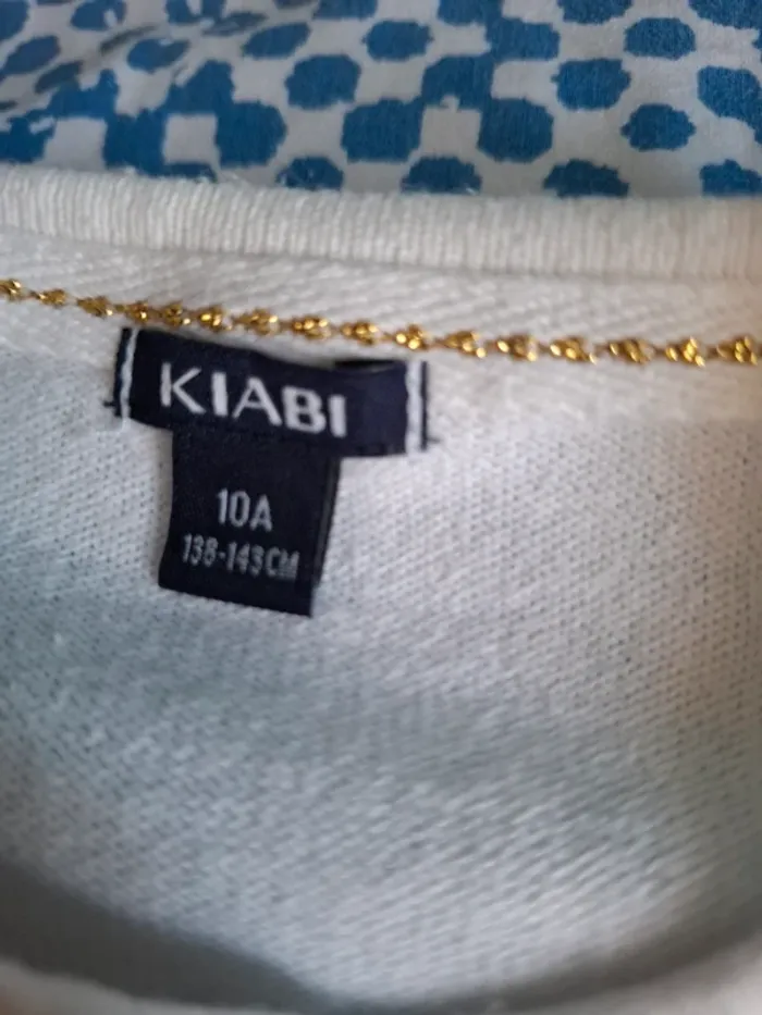 Gilet blanc Kiabi 10 ans - photo numéro 4
