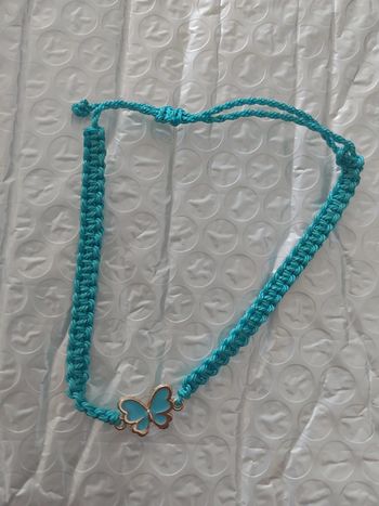 Bracelet tressé turquoise avec papillon