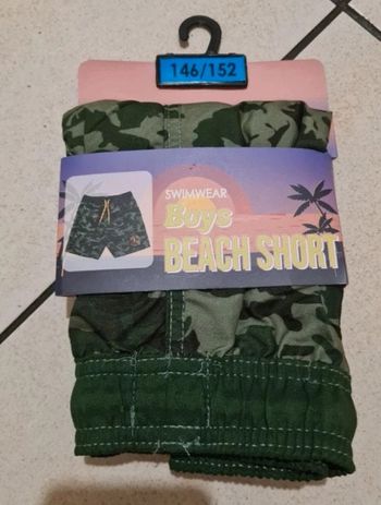 Short de plage neuf 11 12 ans