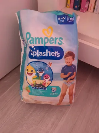 Lot 9 couches de bain 14kg et plus pampers