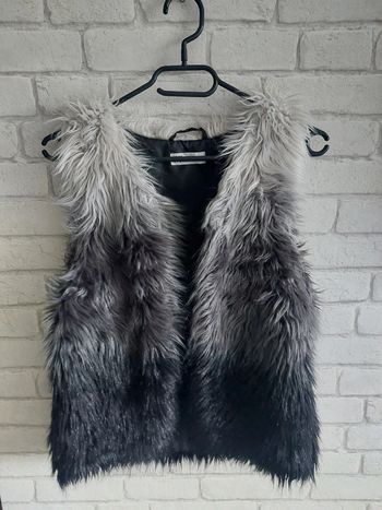 Veste H&M fausse fourrure taille 14 ans