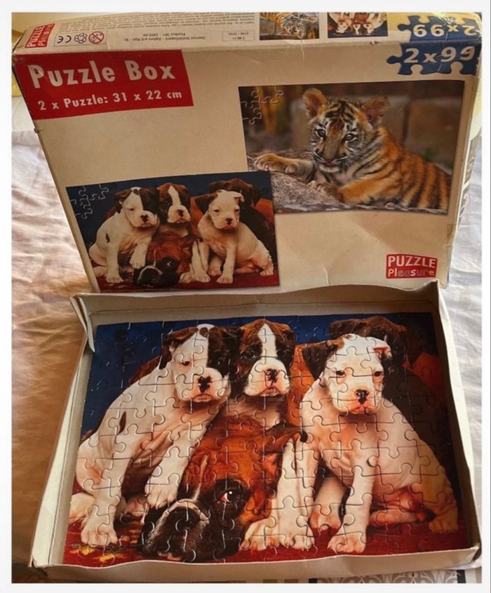 Puzzle chiens – 99 pièces – boîte scotchée