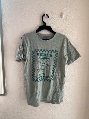 T-shirt taille 12/13 ans 💫