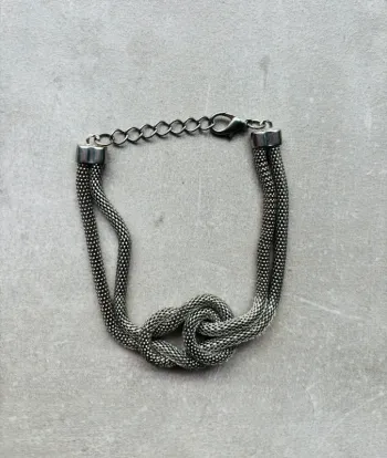 Bracelet argenté mailles effet noeud
