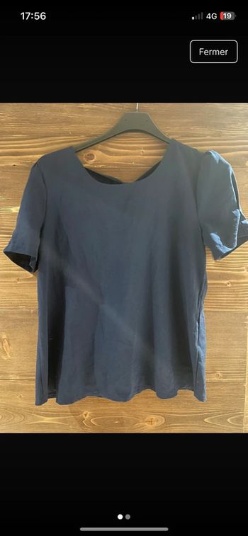 Blouse bleu marine détail noeud dans le dos