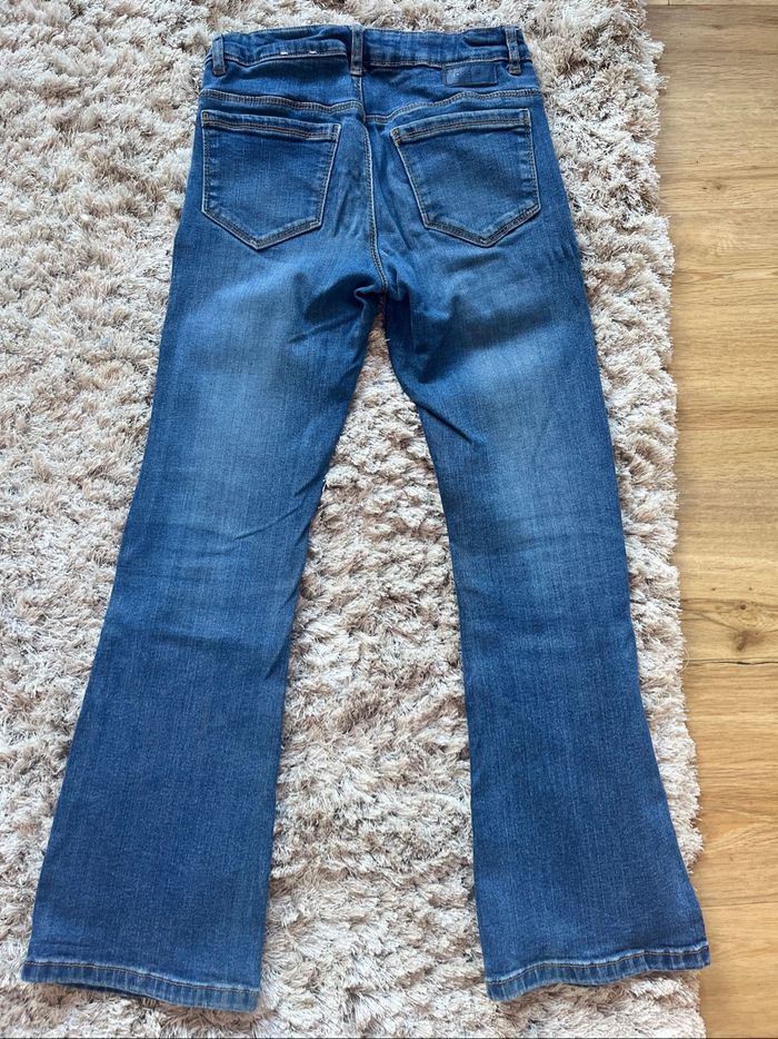 Jeans bleu patte d’éléphant - photo numéro 2