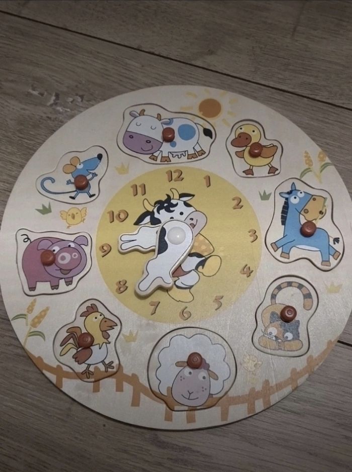 Puzzle en bois horloge et animaux