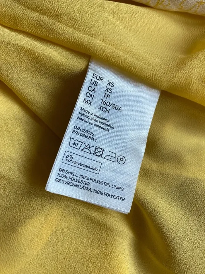 Très jolie robe sans manches H&M taille XS Neuve doublée Tombé élégant - photo numéro 3