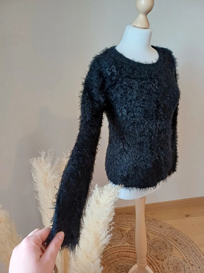 Pull noir chaud avec motif Noeuds Millénium taille S/M 36/38