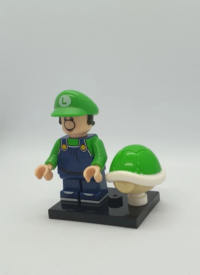 🍄 Figurine Super Mario - Bébé Luigi avec une Carapace Verte - (Style Lego) 🍄 - photo numéro 3