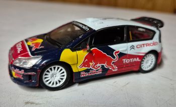 Voiture miniature citroen C4 wrc 1/43 norev No.7 racing red bull total Rallye Portugal 2010