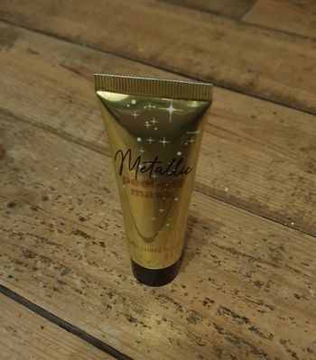 Masque pour le visage "peel-off" métallique doré