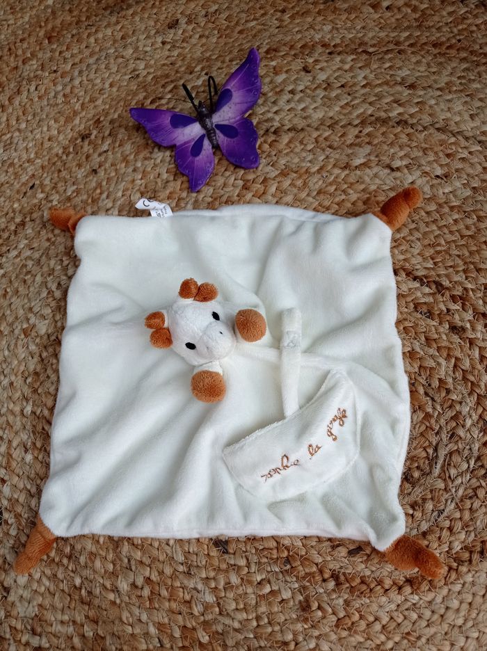 Doudou girafe neuf