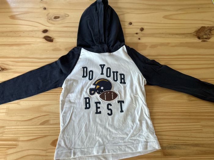 Pull à capuche tape à l’œil