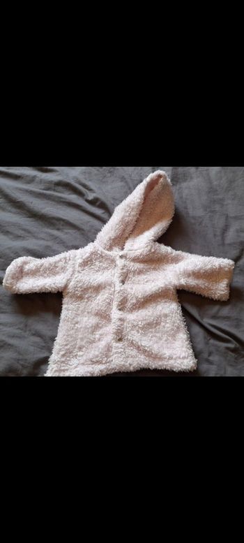 Manteau fausse fourrure 3 mois