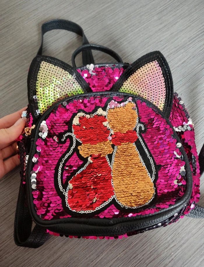 Sac chat qui change de couleur - dressing trié par tailles