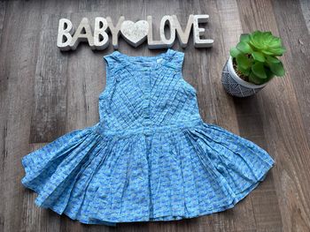 - Robe Obaibi       - 6 mois - Très bon état 