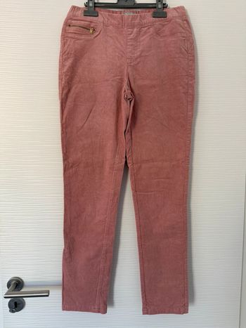 Pantalon en velours rose clair à fermeture éclairs sur les poches