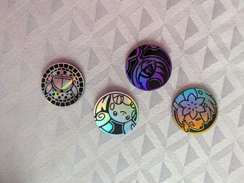 Lot de 4 jetons pokémon