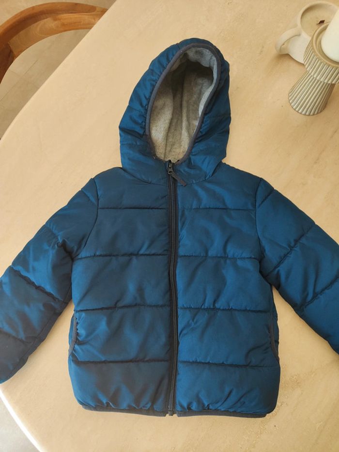 Veste doudoune doublée 4/5 ans très bon état