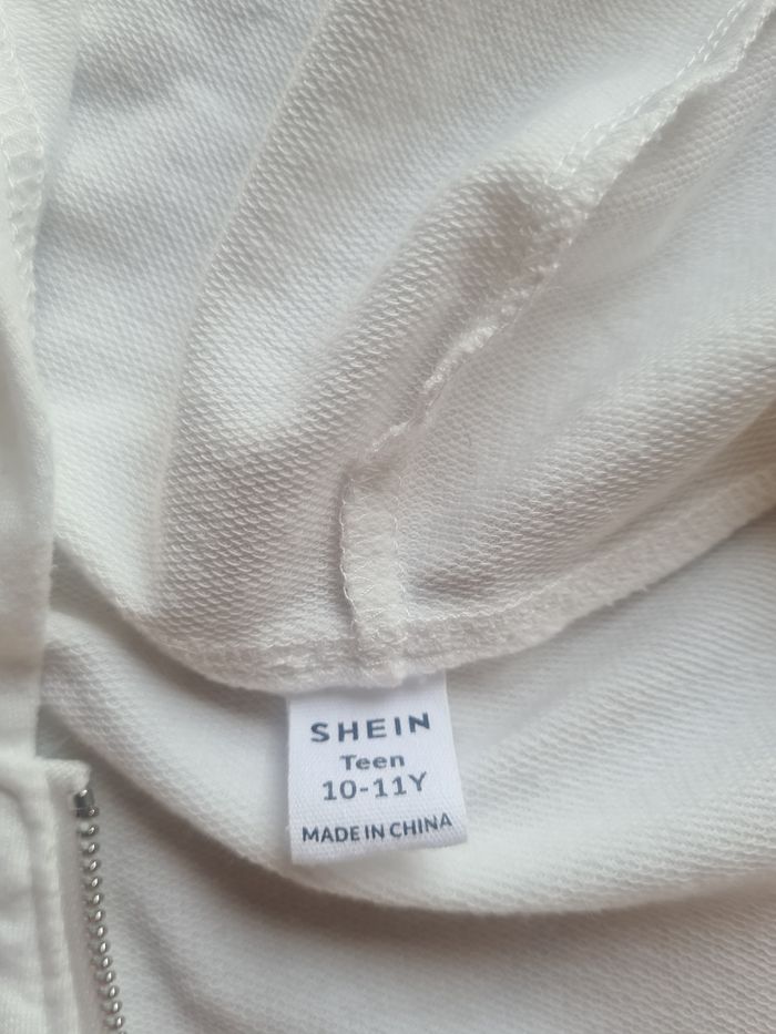 Veste blanche - photo numéro 2