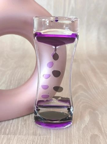Sablier à huile apaisant noir et violet