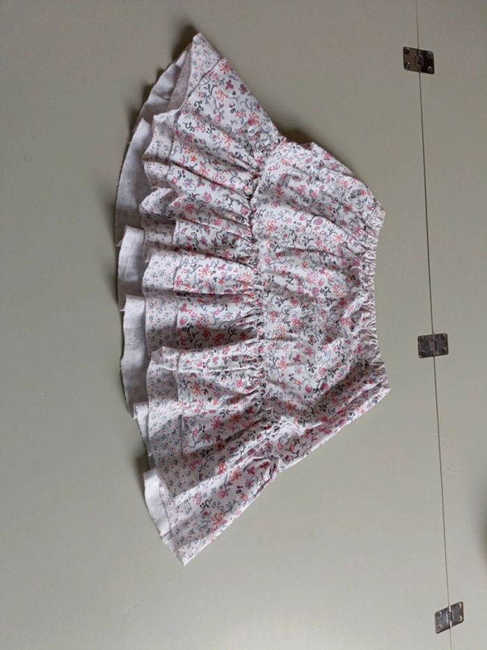 Jupe courte texte kids taille 4 Fleurie