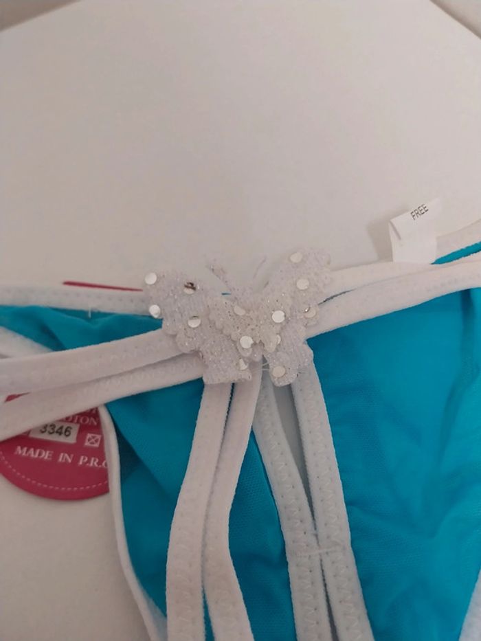 Strings bleu turquoise et blanc avec petit papillon - photo numéro 3