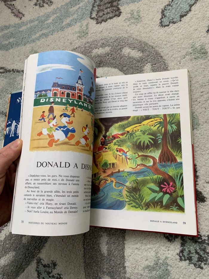 Livre le Monde enchantée de Walt Disney - Histoires du nouveau monde - photo numéro 4