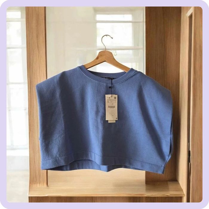 pull court sans manchesZara bleu taille L