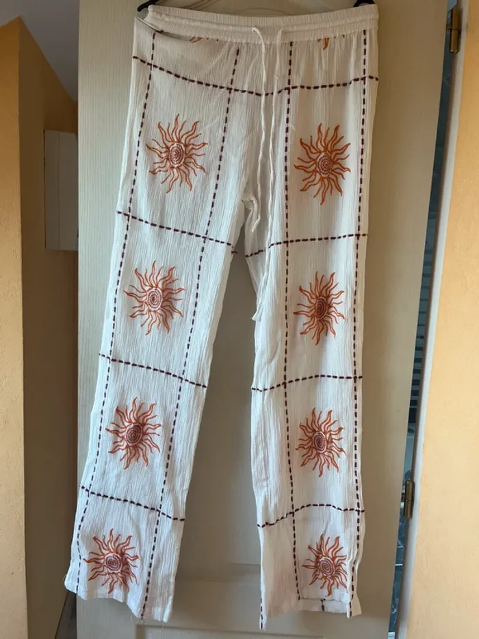 pantalon blanc soleil orange pull and bear