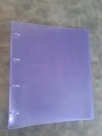 Classeur violet transparent 4 anneaux dos 40 en TBE