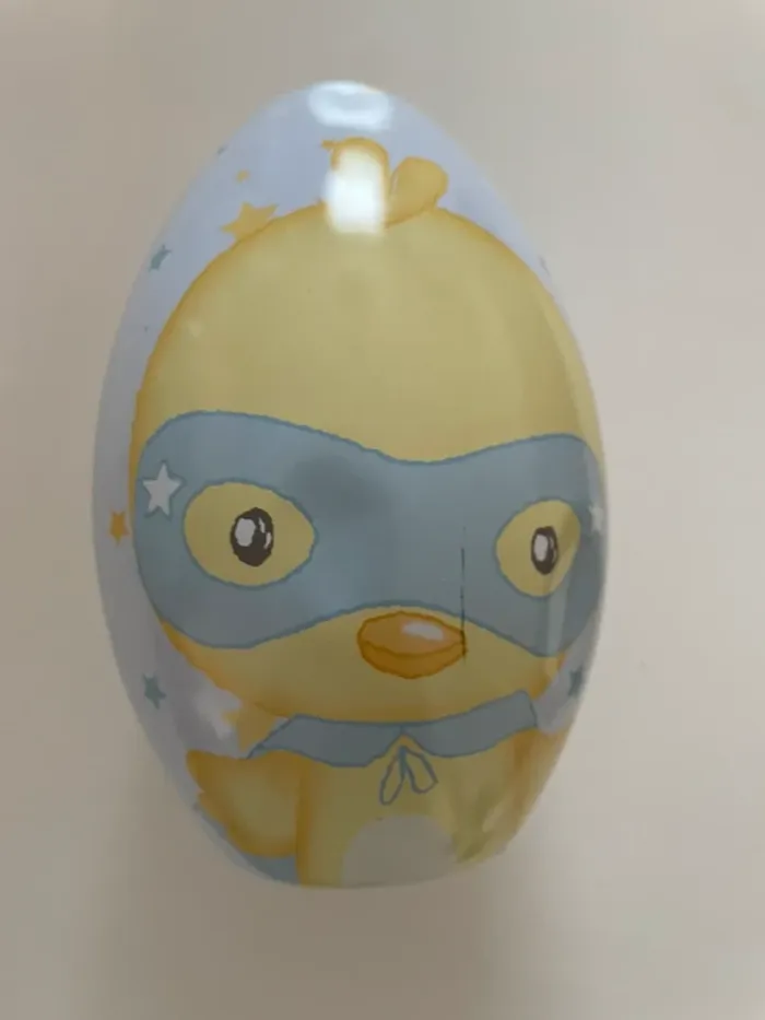 Œuf métal et peluche
