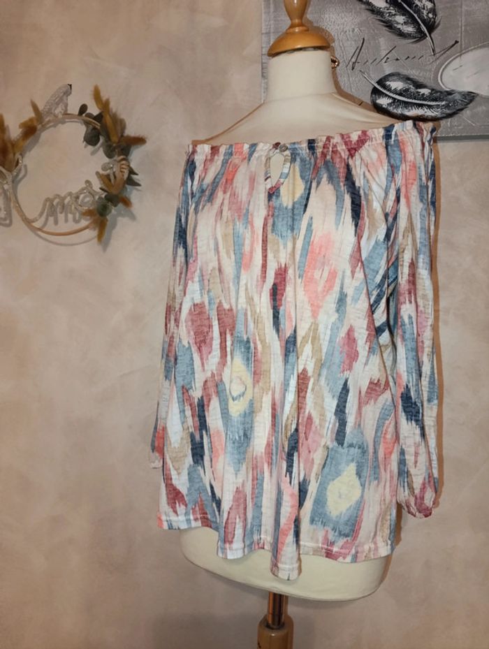 Blouse taille 42/44 en excellent état manches 3/4