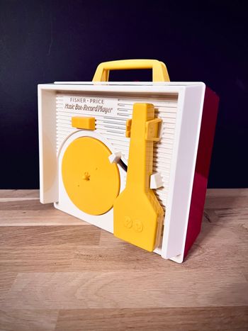 Tourne-disque jouet Fisher-Price Music Box Record Player réédition batterie avec 5 disques - Très bon état