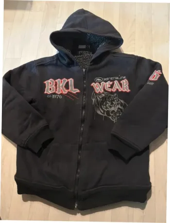 Veste 12 ans épaisse noire bkl wear très bon état