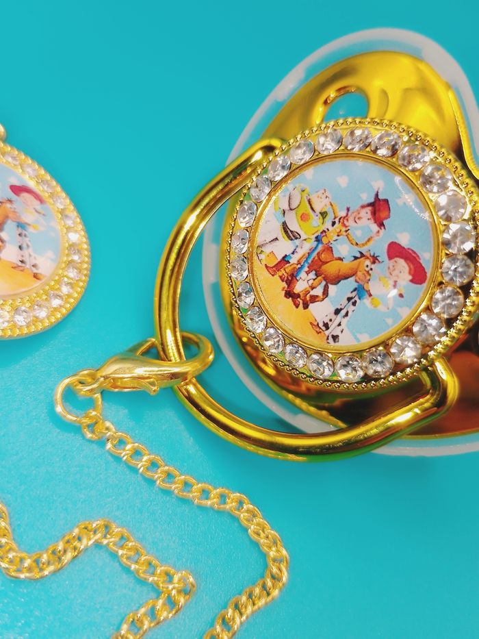 Tétine strass avec attache Toy story