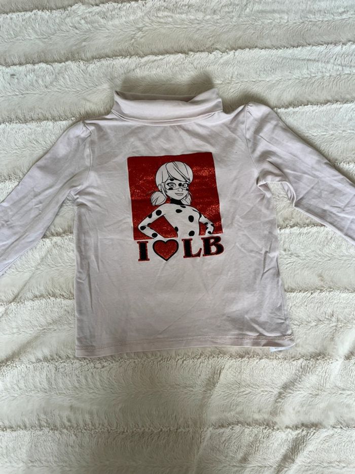 Pull col roulé