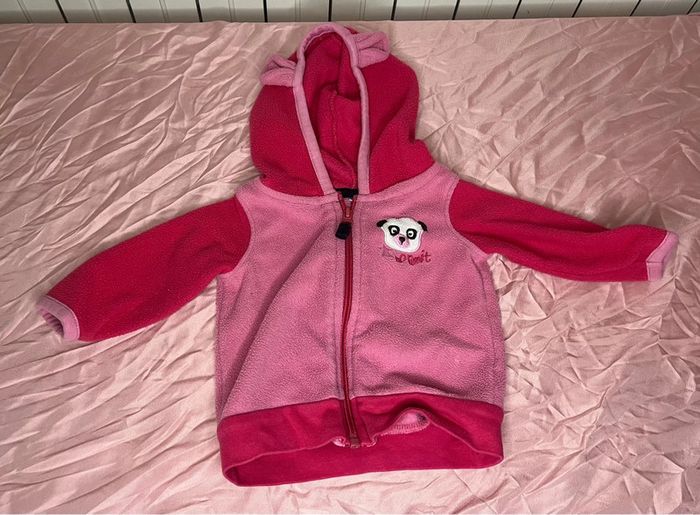 Gilet rose à capuche
