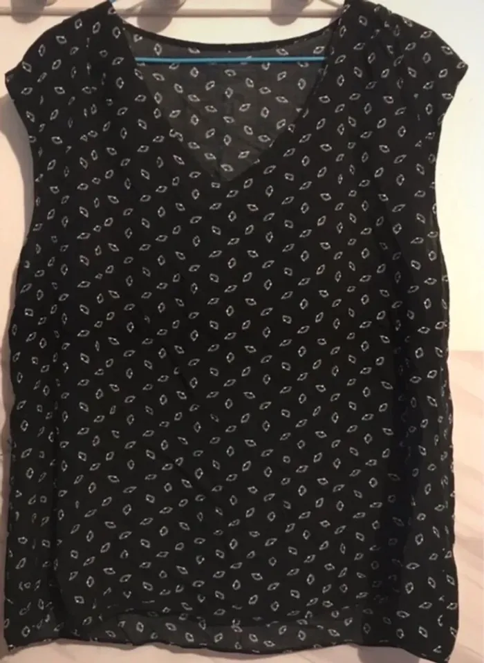Haut femme noir et blanc sans manches taille XL