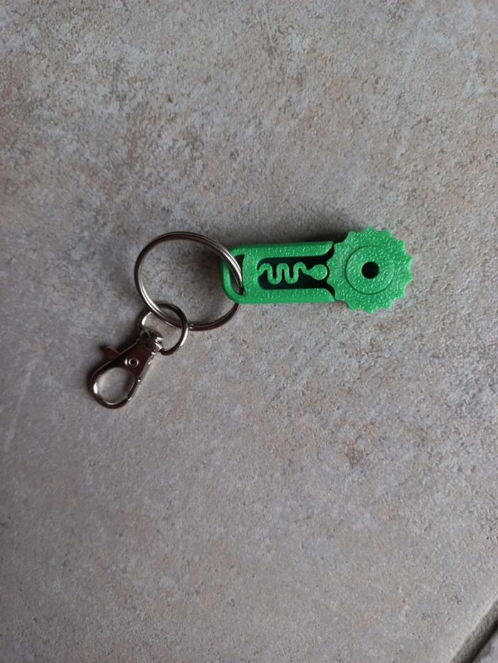 Porte clés engrenages neuf