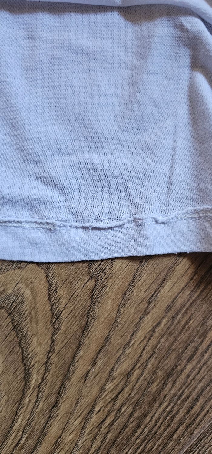 Lot de vêtements taille 8 ans présentant des défauts - photo numéro 3