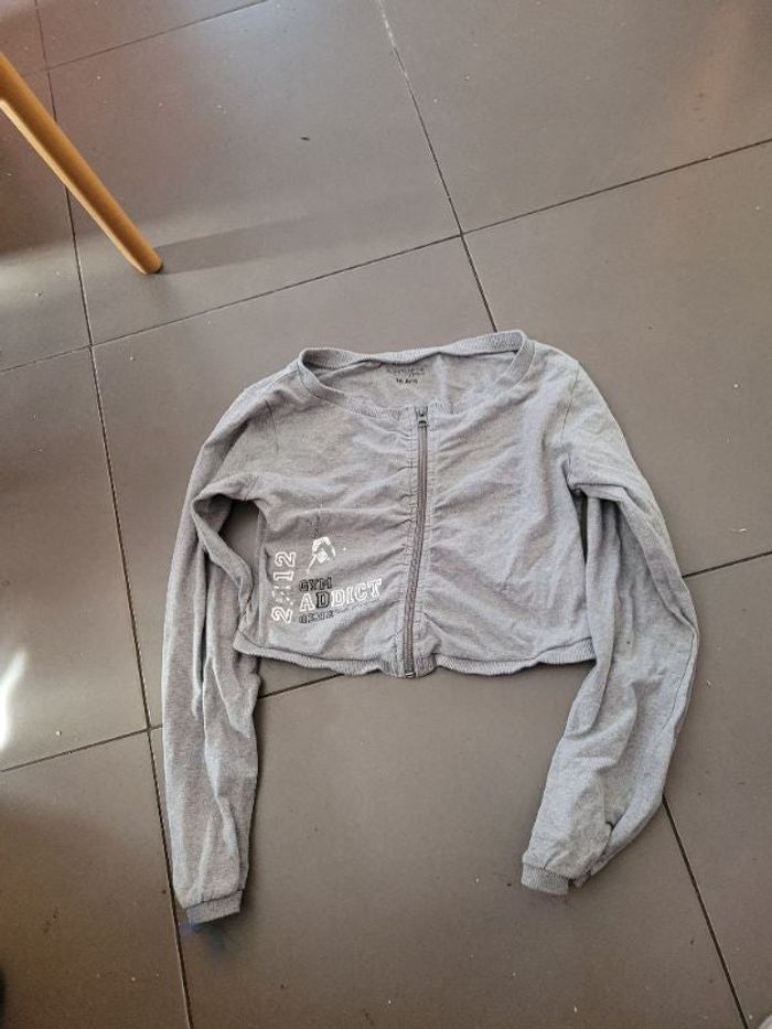 Gilet 16 ans oin extenso