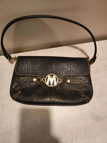 Pochette noire et doré